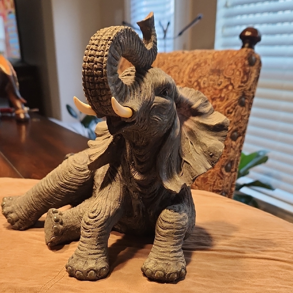 Gray Decorative Elephant Figurine with Ivory Tusks